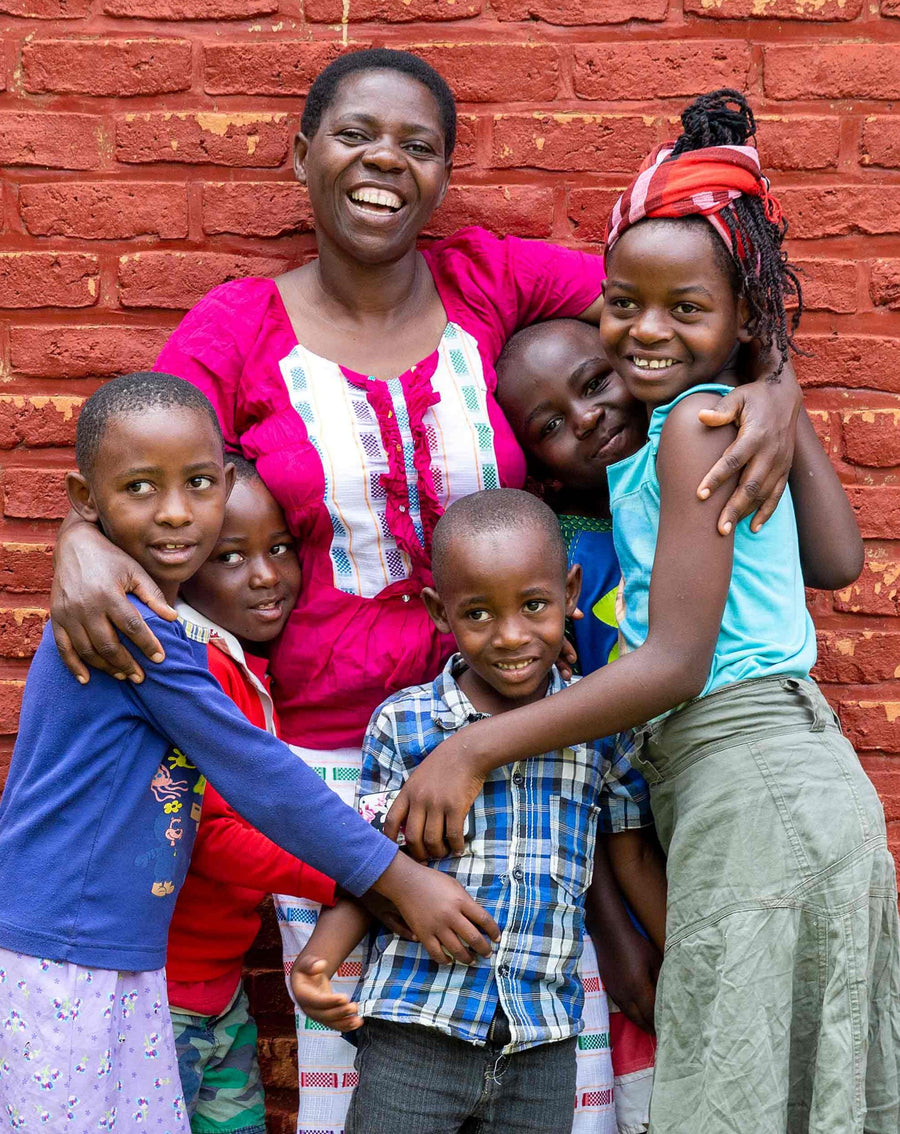A DuHope artisan with her family